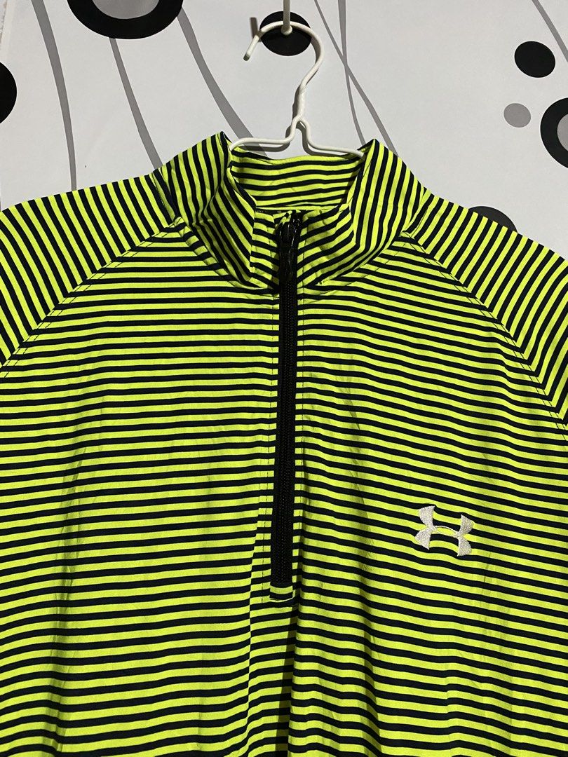 Under Armour long-sleeve, quarter-zip athletic top (Category: Activewear) located in Cebu City. Submitted by patspickph (Listing ID 1468787324, Image 2). Description: This is a neon yellow and dark/gray micro-striped Under Armour long-sleeve, quarter-zip athletic top with a mock neck and moisture-wicking HeatGear-style fabric. Size XXL on tag dimensions W22 L29.5. Good As New No issue Excellent Condition👍👌.