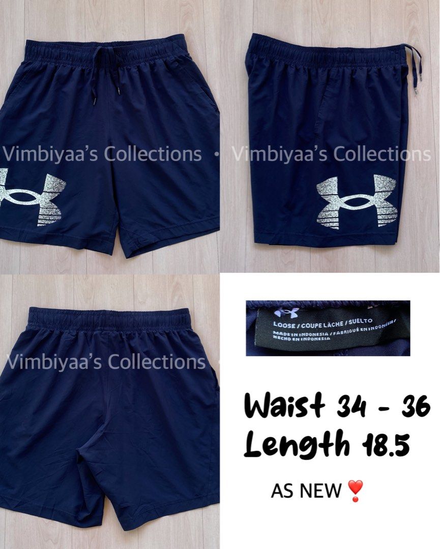 Under Armour Navy Blue Shorts (Category: Shorts) located in Santo Tomas. Submitted by jjessavimj66752 (Listing ID 1468844661, Image 1). Description: - Brand: Under Armour - Color: Navy Blue - Fit: Loose fit for maximum comfort - Waist: Elastic waistband with adjustable drawstring (fits 34 to 36 inches) - Length: 18.5 inches - Features: Convenient side pockets and large textured UA logo on the left hem - Origin: Made in Indonesia - Condition: Exce