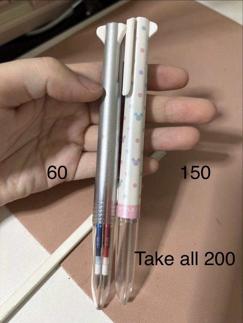 Uni Style Fit Multi Pens Silver and Mickey Mouse (Category: Stationery & School Supplies) located in Pasig City. Submitted by mklnjln1 (Listing ID 1468867106, Image 1). Description: - Set of 2 multi pens, ideal for school work or journaling - Silver Metal Pen: Features blue and red ink refills - ₱60 - Mickey Mouse Edition: White barrel with cute polka dot pattern - ₱150 - Bundle Deal: Buy both together for only ₱200 - Condition: Brand new / Great