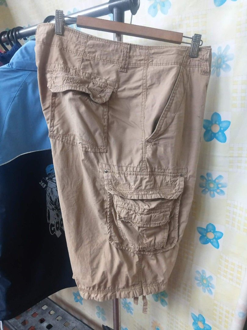 UNIONBAY Khaki Cargo Shorts Plus Size (Category: Shorts) located in Pasig City. Submitted by rjkfindsofficial (Listing ID 1468774969, Image 3). Description: ITEM DETAILS & SPECS: • Brand: UNIONBAY • Color: Khaki / Tan / Light Brown • Material: 100% Cotton (Durable canvas/twill cotton) • Tag Size: Size 40 (Plus Size / Big Size) • Made in: Vietnam • Condition: Preloved • Legitimacy: 100% Authentic Unionbay (Complete inner waist prints, care tags, a