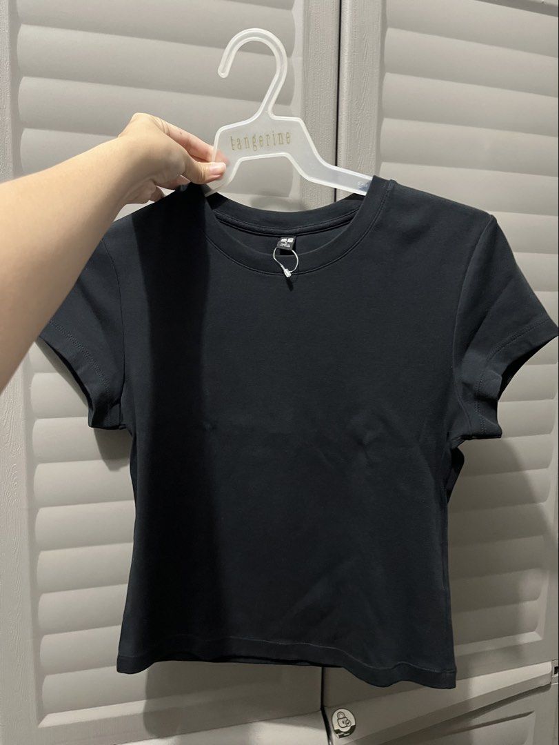 Uniqlo Black Shirt (Category: Shirts) located in Cagayan de Oro. Submitted by prelovederela (Listing ID 1468782076, Image 1). Description: like new!! used twice onlyy.