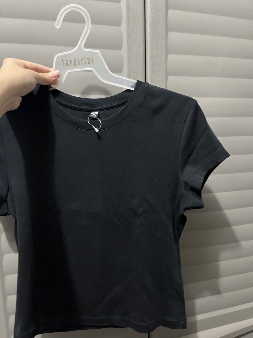 Uniqlo Black Shirt (Category: Shirts) located in Cagayan de Oro. Submitted by prelovederela (Listing ID 1468782076, Image 2). Description: like new!! used twice onlyy.