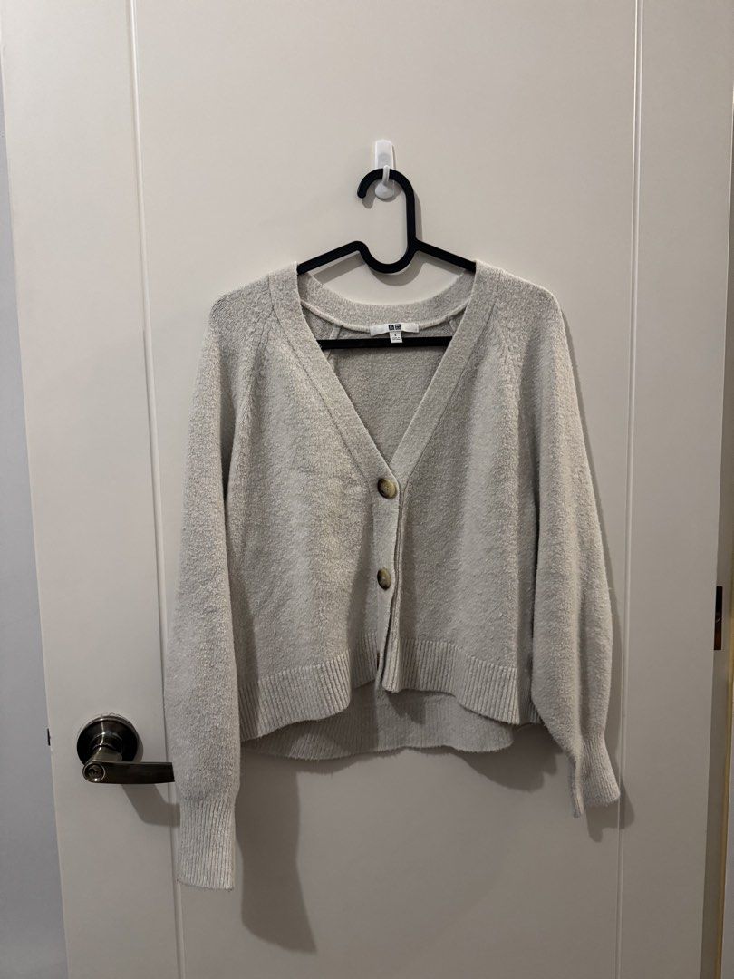 Uniqlo Cardigan (Category: Coats, Jackets and Outerwear) located in Mandaluyong City. Submitted by vielscloset (Listing ID 1468849726, Image 1). Description: Uniqlo Cardigan (S) - 8/10 condition - Well-used but no visible damages.