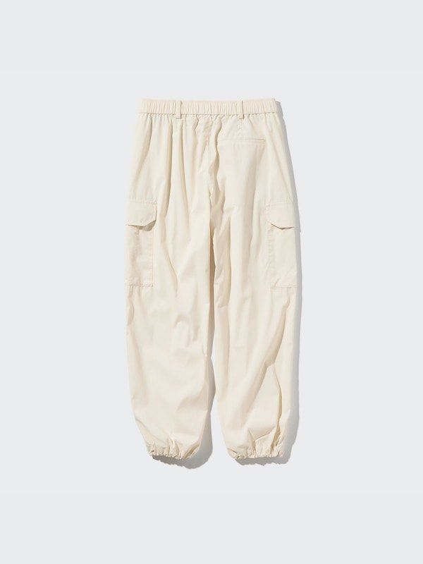 Uniqlo Easy Cargo Pants (Category: Jeans) located in Quezon City. Submitted by cozykath (Listing ID 1468730762, Image 2). Description: - Uniqlo Beige Cargo Pants - Size: Medium - Waist: 63-69cm - Hip: 88-94cm - Material: Cotton/Nylon blend (body), Polyester/Cotton (pocket lining) - Features: Elastic waistband, drawstring - Condition: Visible yellow stains on fabric - Made in: China.