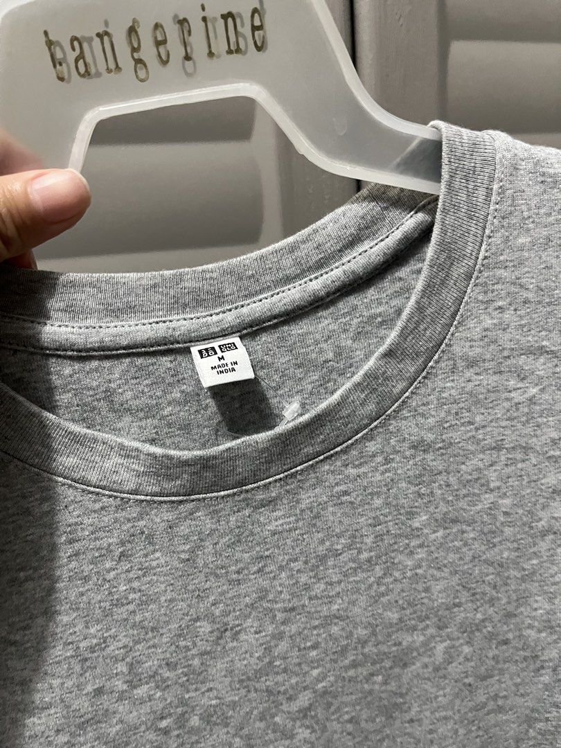 Uniqlo Grey Shirt (Category: Shirts) located in Cagayan de Oro. Submitted by prelovederela (Listing ID 1468781923, Image 3). Description: fits s-semi med frames used twice only!.