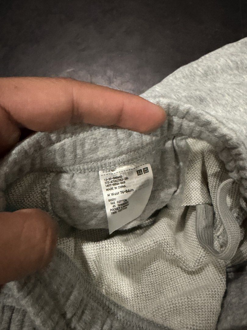 Uniqlo Grey Sweat Shorts Size M (Category: Shorts) located in Manila. Submitted by pacb1212 (Listing ID 1468851489, Image 2). Description: - Brand: Uniqlo - Item: Grey Sweat Shorts - Size: M (Fits waist 76 to 84cm) - Material: 96% cotton, 4% spandex; 100% cotton pocket lining - Features: Elastic waistband with adjustable drawstring - Condition: Clean and ready to wear - Style: Ideal for comfortable loungewear or casual everyday wear.