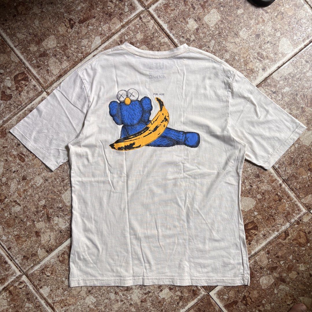 Uniqlo Kaws (Category: Tshirts & Polo Shirts ) located in Manila. Submitted by loydgani (Listing ID 1468765730, Image 2). Description: Length 30 Width 22 Sleeve Length 19 Size (Xl) on tags Issue ❌ price + sf 📍Cebu.