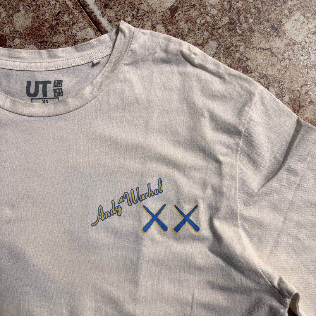 Uniqlo Kaws (Category: Tshirts & Polo Shirts ) located in Manila. Submitted by loydgani (Listing ID 1468765730, Image 3). Description: Length 30 Width 22 Sleeve Length 19 Size (Xl) on tags Issue ❌ price + sf 📍Cebu.