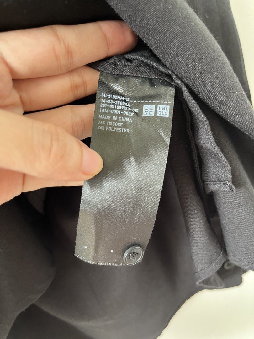 Uniqlo Rayon Blouse Black (Category: Blouses) located in Santa Rosa. Submitted by thrifty_bev (Listing ID 1468926661, Image 3). Description: - Brand: Uniqlo - Item: Rayon Blouse - Color: Classic Black - Material: 76% Viscose, 24% Polyester (smooth & premium feel) - Features: Button-down front, classic collar, long sleeves - Versatility: Ideal for office wear, smart-casual, or weekend styling.
