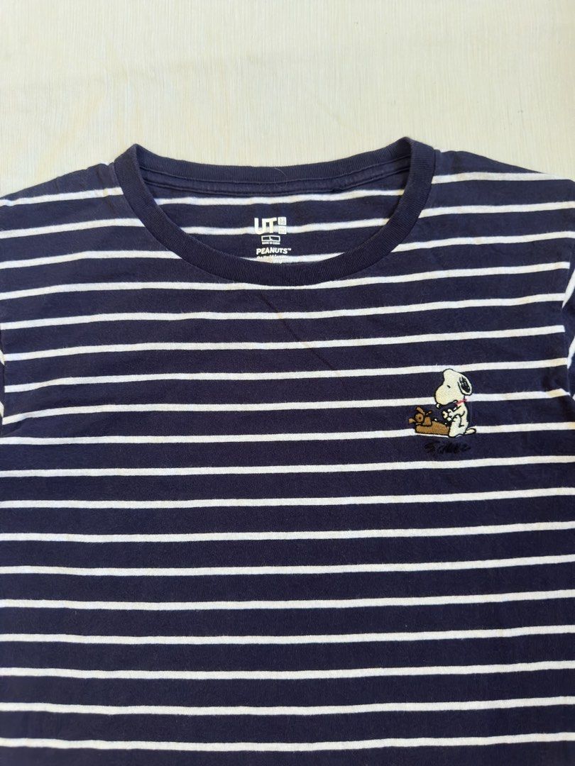 UNIQLO SNOOPY (Category: Tshirts & Polo Shirts ) located in Davao. Submitted by kelsocool (Listing ID 1468800661, Image 2). Description: Uniqlo UT Peanuts Snoopy Striped Navy Tee Size: L Dimes (inch): 23.5 - length 18 - width 7.5 - sleeve color rate: 9/10 good condition issue - none Description: Uniqlo UT Peanuts collaboration crewneck tee in navy blue with thin white horizontal stripes and embroidered Snoopy chest embroidery..