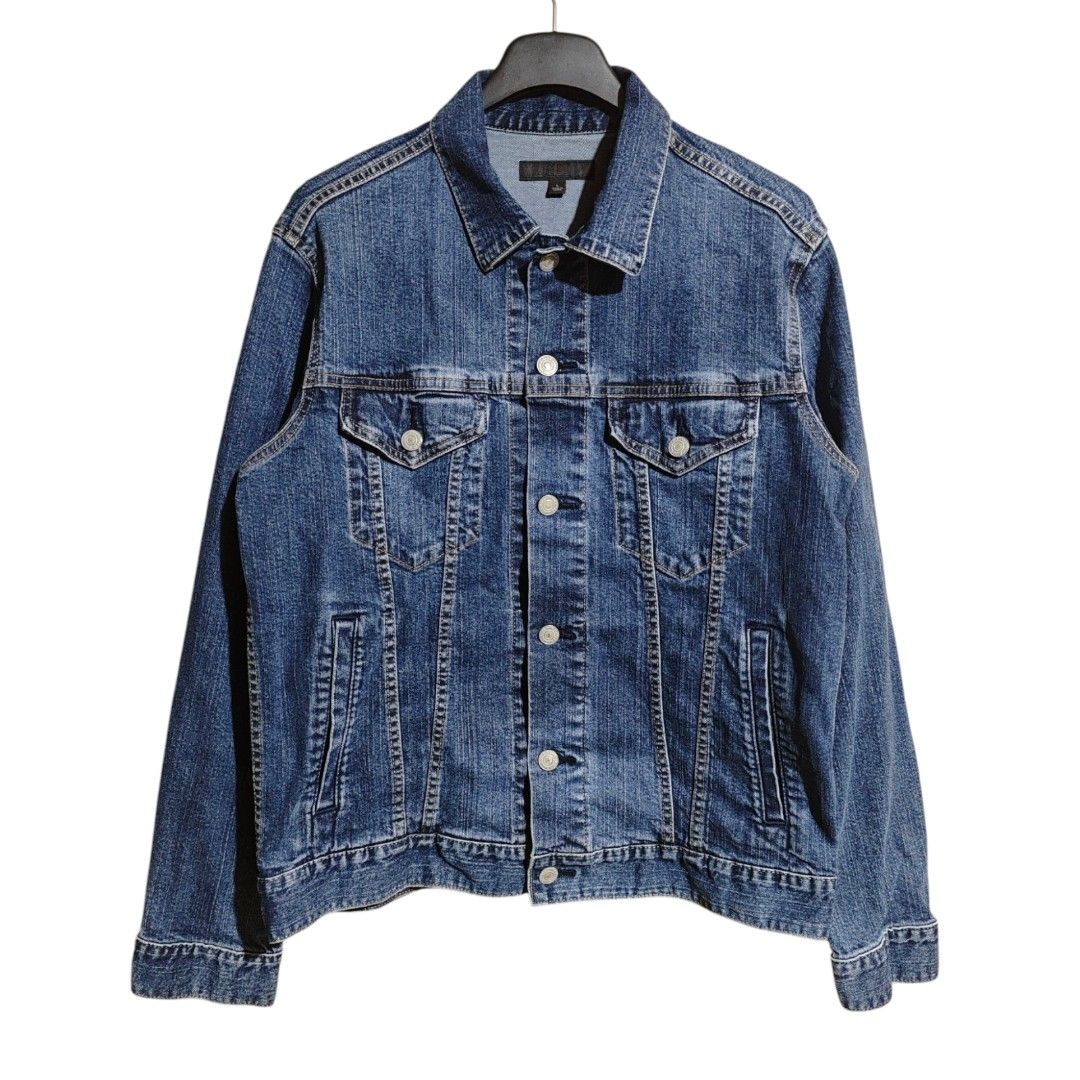 UNIQLO Type III Denim Trucker Jacket (Category: Coats, Jackets and Outerwear) located in Quezon City. Submitted by oldturnedtogold (Listing ID 1468723667, Image 2). Description: UNIQLO Type III Denim Trucker Jacket Size Large Dark Blue denim Shoulder Width - 17.5" Body length - 25" Chest Width - 20.5" Sleeve Length - 24.5" Details: - Cotton spandex fabric - Slim fit - Type III construction with buttoned front closure, adjustable waist tabs, and v