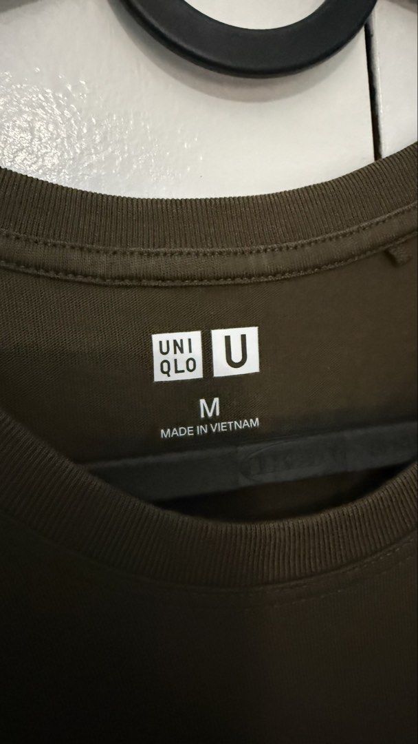 Uniqlo U Supima T-Shirt (Category: Shirts) located in Makati City. Submitted by clutterfreejia (Listing ID 1468754309, Image 2). Description: Store bought Color: brown? No flaws, worn more or less 5x only Rfs: decluttering.