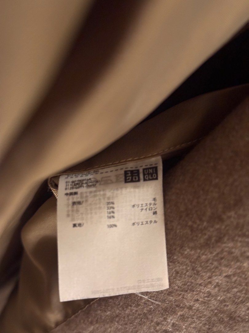 Uniqlo U Wool Blend Tailored Jacket Brown Medium (Category: Coats, Jackets and Outerwear) located in Cabanatuan. Submitted by omojiee (Listing ID 1468714052, Image 3). Description: - Brand: Uniqlo U - Style: Brown blazer - Size: M - Material: Wool blend with smooth inner lining - Features: Two front buttons, patch pockets, and an inside pocket - Condition: Clean, brand new with tag still attached on the collar.