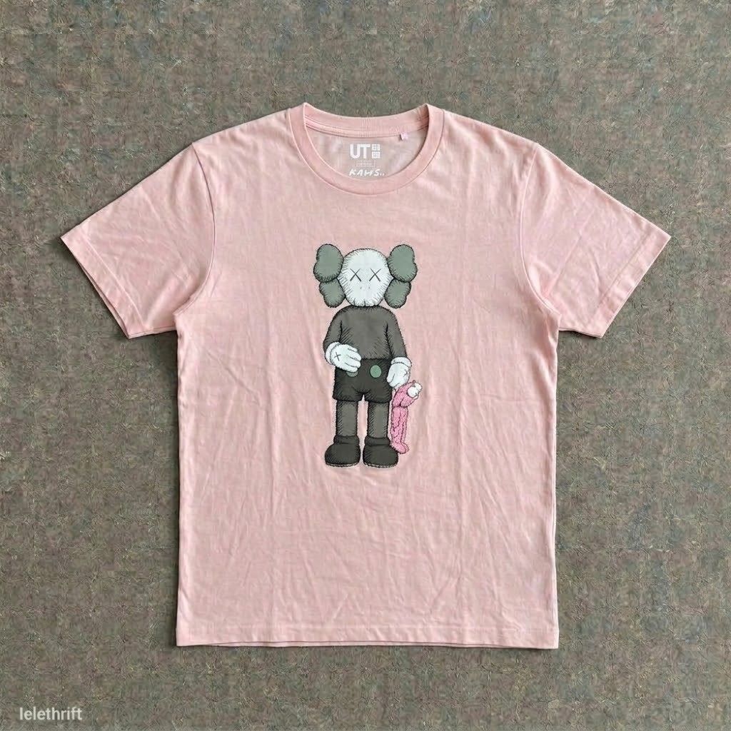 Uniqlo x Kaws (Category: Tshirts & Polo Shirts ) located in Batangas. Submitted by lelethrift.com (Listing ID 1468859535, Image 1). Description: Uniqlo x Kaws Size: Large Complete tags tubular type shirt ready to use, napa laundry na flawless print, no crack and scratch.