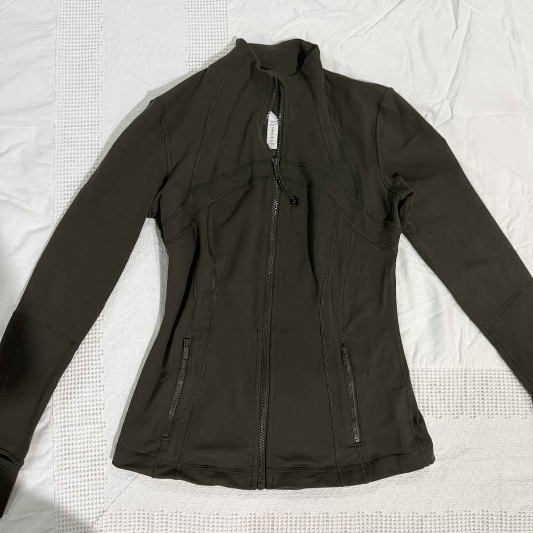 US 6 | Lululemon Define Jacket Dark Olive (Category: Activewear) located in San Juan City. Submitted by sunnycycle (Listing ID 1468816589, Image 2). Description: Size: US 6 Color: Dark Olive Condition: 10/10 Perfect for low impact sports. Pilates, yoga, athleisure. Helping tags: Adidas Nike Lululemon Gymshark Outdoor Voices Beyond Yoga Athleisure Wilson Alo Yoga Sports Bra .