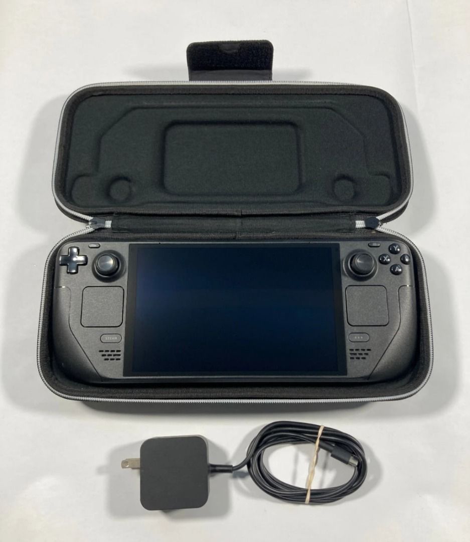 Valve Steam Deck OLED 1 TB Handheld Gaming System (Category: Others) located in Manila. Submitted by wildfish_ab43bc (Listing ID 1468888044, Image 1). Description: - Device: Valve handheld gaming console - Condition: Clean screen, body, thumbsticks, and buttons - Inclusions: Original hard carrying case and power adapter with neatly tied cable - Status: Ready for gaming on the go For a quick response, please write to wha-tsa.pp 63-9469-504-673.