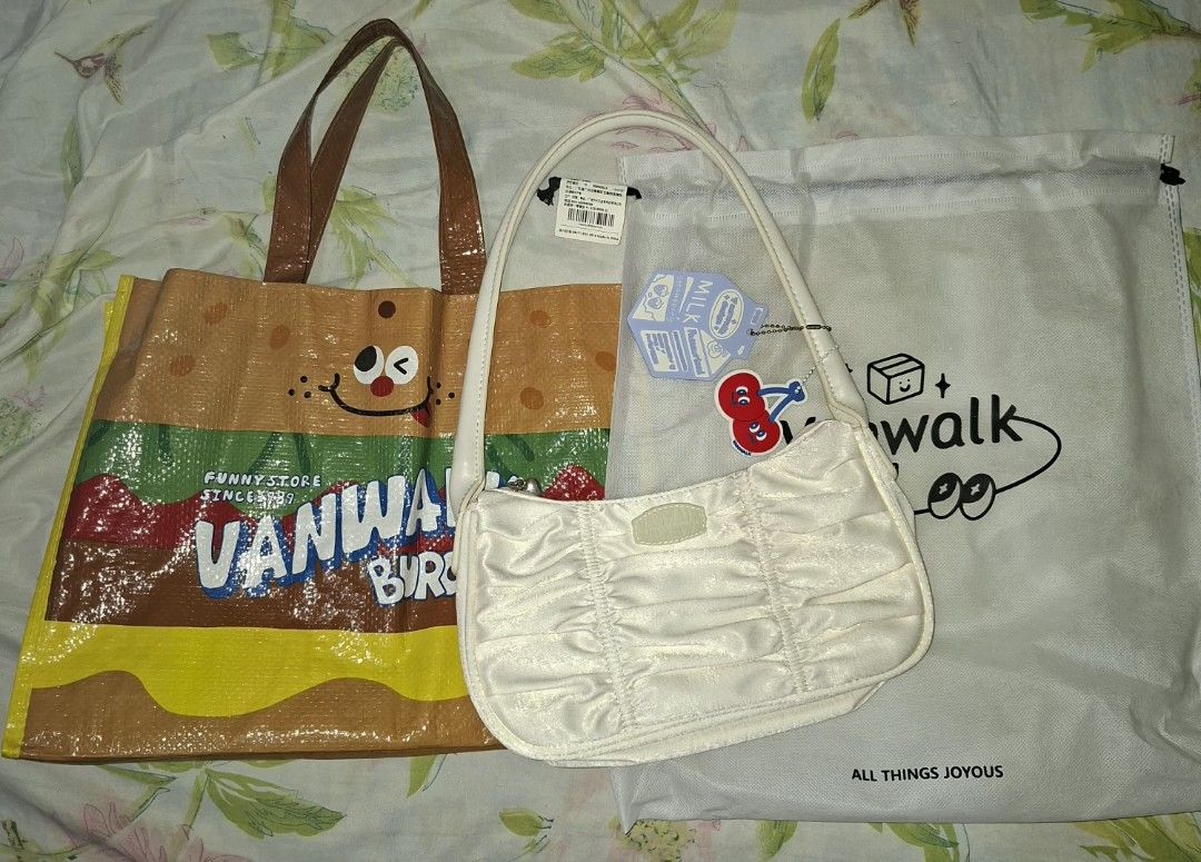 Vanwalk shoulder bag (Category: Shoulder Bags) located in Davao. Submitted by lovelybones729 (Listing ID 1468739162, Image 1). Description: never been used vanwalk shoulder bag in white. with charm, dustbag and tote bag no box anymore bought for 1050 last year.