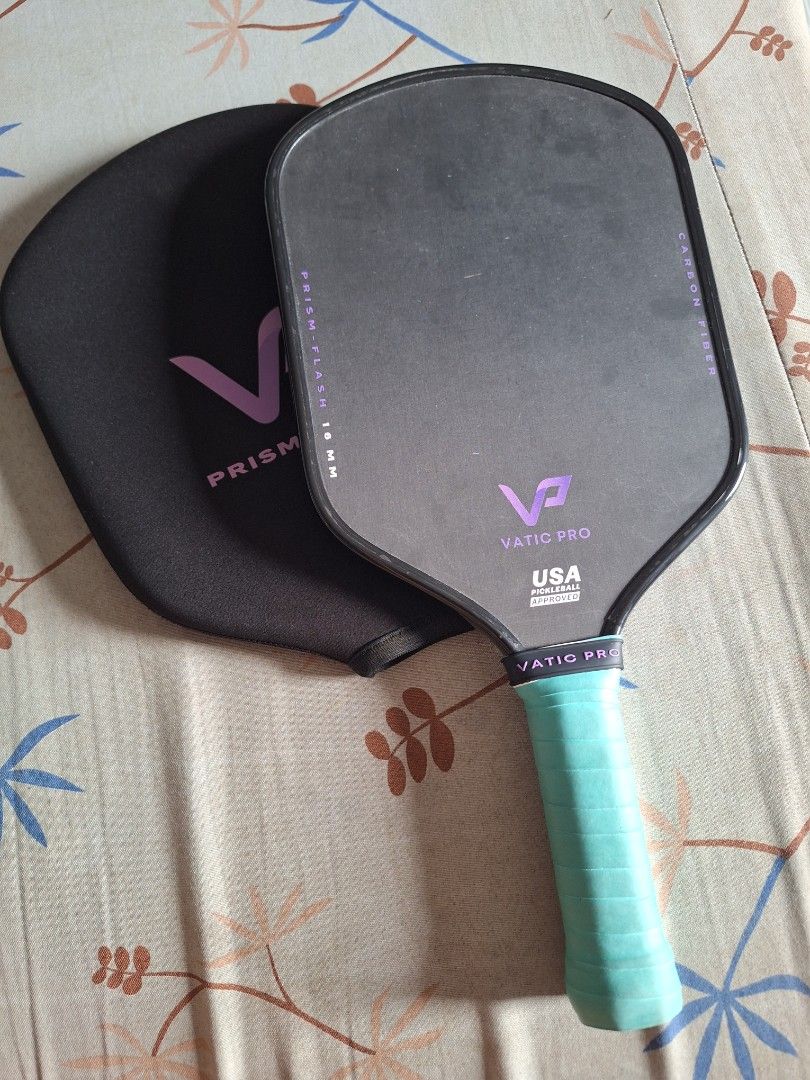 VATIC PRO PRISM FALSH (Category: Racket and Ball Sports) located in Caloocan City. Submitted by southxeast21.356 (Listing ID 1468717728, Image 2). Description: VATIC PRO PRIM FLASH GOOD CONDITION 9/10 WITH EDGE GUARD WITH FREE GRIP TAPE Face Material: Raw Toray T700 carbon fiber with heat-compressed texturing Core Material: 16mm (or 14mm) premium polymer honeycomb / polypropylene core Length: 16.2 inches (Standard) Width: 7.7 inches Average Weigh