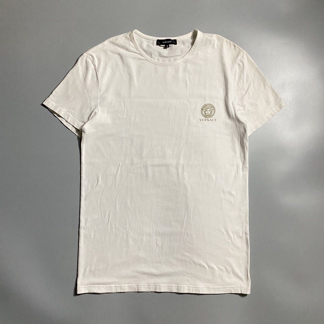 Versace Medusa White T-shirt (Category: Tshirts & Polo Shirts ) located in Manila. Submitted by curatedvg. (Listing ID 1468830101, Image 1). Description: Width: 18.5 inches Length: 27 inches Size S - M (slim fit) Excellent condition Cut care tag No stains or pinholes Color rate: 9/10 .