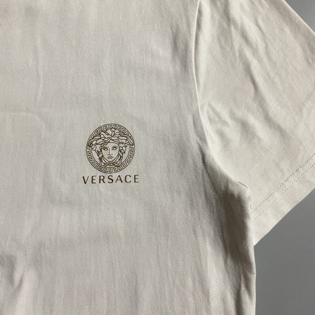 Versace Medusa White T-shirt (Category: Tshirts & Polo Shirts ) located in Manila. Submitted by curatedvg. (Listing ID 1468830101, Image 2). Description: Width: 18.5 inches Length: 27 inches Size S - M (slim fit) Excellent condition Cut care tag No stains or pinholes Color rate: 9/10 .