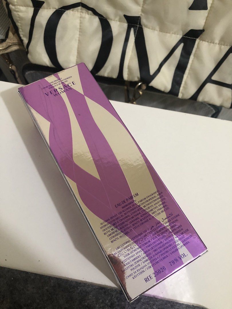 Versace Woman Eau de Parfum 50ml (Category: Fragrance & Deodorants) located in Bulacan. Submitted by kkaye_ (Listing ID 1468826794, Image 2). Description: - Brand: Versace Woman - Type: Eau de Parfum Spray - Volume: 50 ml / 1.7 US fl. oz. - Condition: Brand new, unsealed but unused (bottle and box shown in photos) - Packaging: Comes with original purple and cream patterned box - Fragrance Profile: Beautiful floral scent, ideal for daily wear - Pe