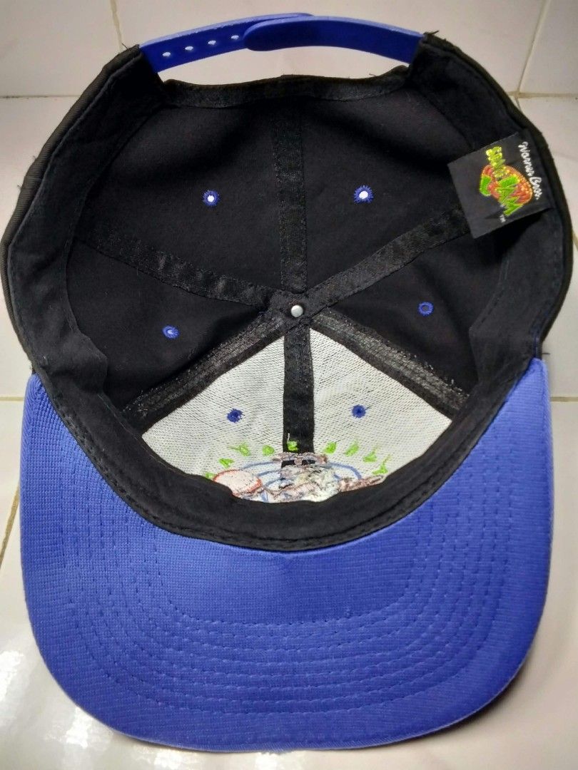 Vintage 1996 Space Jam Taz Tune Squad Snapback Cap (Category: Caps & Hats) located in Aroroy. Submitted by pinaskaboo (Listing ID 1468754927, Image 2). Description: - Vintage 1996 Space Jam snapback by Fresh Caps - Classic black crown with a contrasting royal blue brim - Front features embroidered Tazmanian Devil and Tune Squad lettering - Authentic Warner Bros tag inside - 100% cotton material - One size fits all with adjustable snapback closure