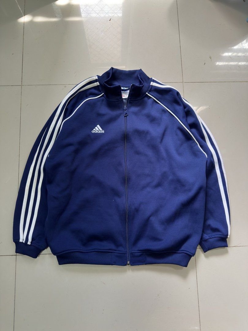 Vintage 90’s Adidas Track Jacket (Category: Coats, Jackets and Outerwear) located in Cavite. Submitted by brick.mnl (Listing ID 1468769113, Image 1). Description: Size XL youth fits Large-XL Dimes: 24x27 With zipper pockets Like new condition No flaws or issue .