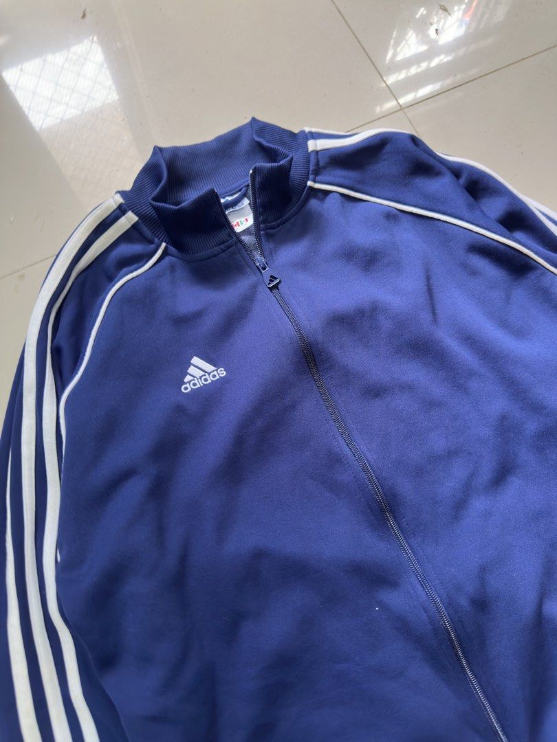 Vintage 90’s Adidas Track Jacket (Category: Coats, Jackets and Outerwear) located in Cavite. Submitted by brick.mnl (Listing ID 1468769113, Image 2). Description: Size XL youth fits Large-XL Dimes: 24x27 With zipper pockets Like new condition No flaws or issue .