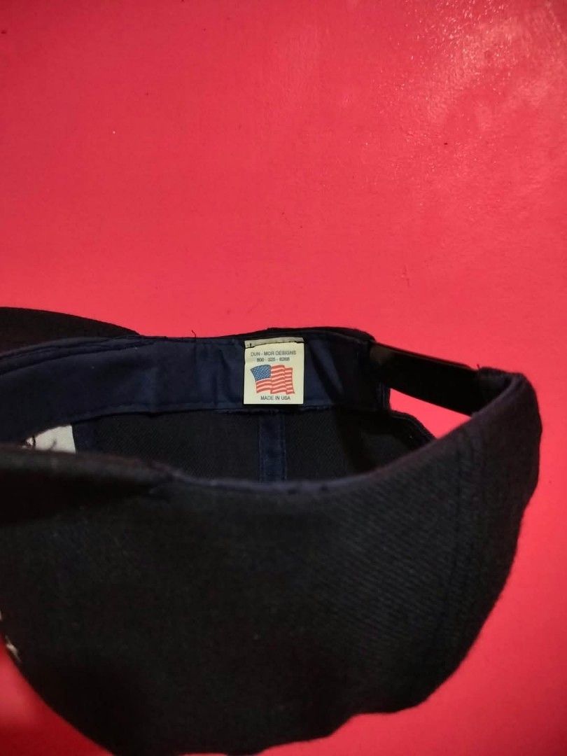 Vintage Alien World Global Takeover Snapback Hat (Category: Caps & Hats) located in Mangaldan. Submitted by niftythrifty69 (Listing ID 1468781387, Image 3). Description: - Brand: Dun-Mor Designs (Made in USA, 2001 vintage) - Design: Embroidered 'Alien World Global Takeover' with red and white alien details - Color: Classic black - Fit: Adjustable plastic snapback closure - Condition: Clean structure, ready to wear - Style: Retro streetwear.