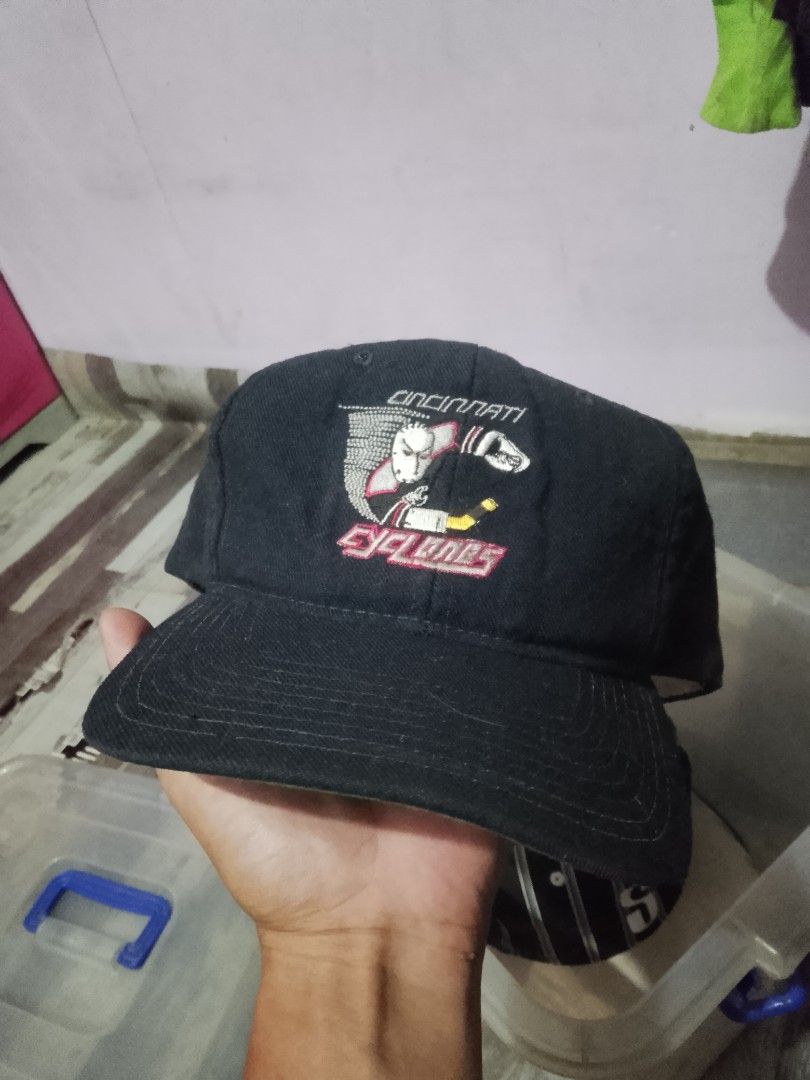 Vintage Cincinnati Cyclones Yupoong Snapback Cap (Category: Caps & Hats) located in Quezon City. Submitted by theoneshop1 (Listing ID 1468892580, Image 1). Description: - RARECincinnati Cyclones snapback cap in classic black - Bold embroidered team graphics on the front panel - Adjustable Yupoong plastic snap closure for a custom fit - Structured crown with a stylish flat brim - Manufactured in the Dominican Republic with solid construction and c