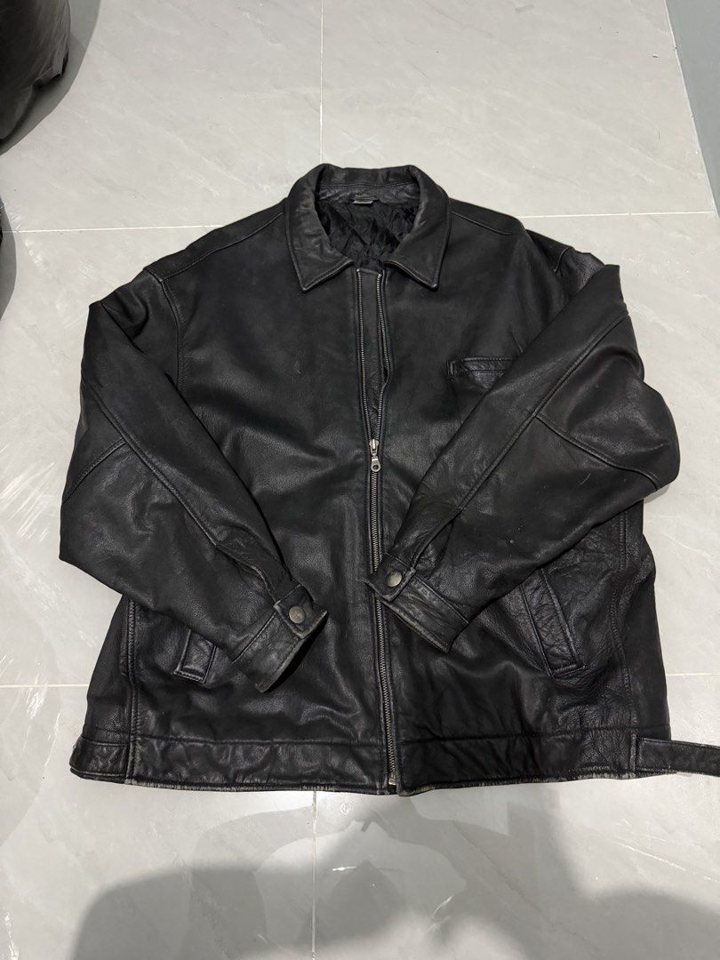 Vintage Genuine Leather Jacket (Category: Coats, Jackets and Outerwear) located in Mandaluyong City. Submitted by declutteringggg101 (Listing ID 1468922178, Image 1). Description: With “Rep” (Taylor Swift) at the back- removable by washing/alcohol .