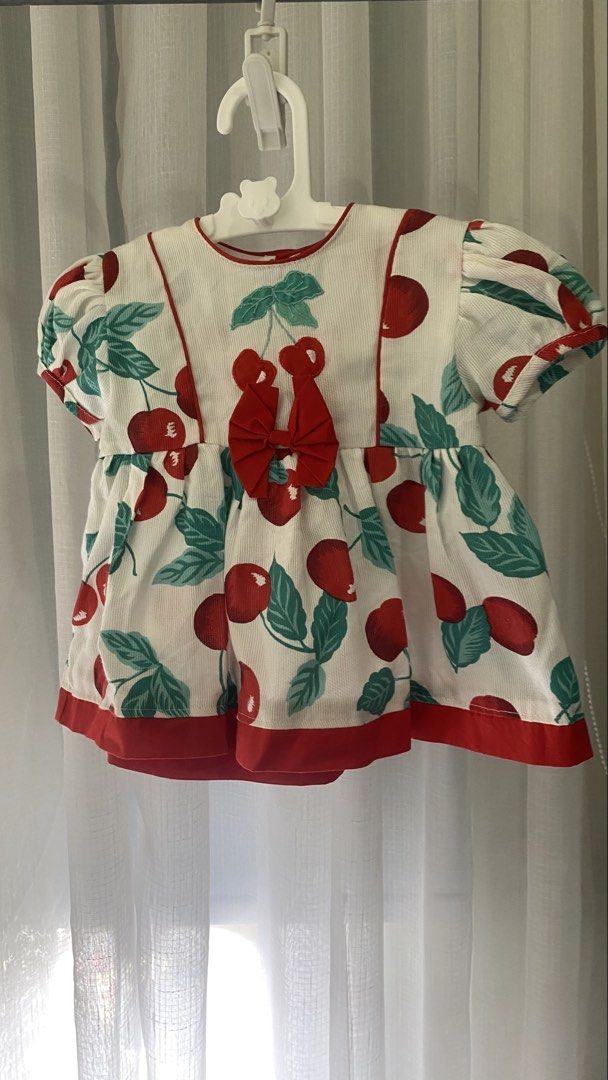 vintage inspired cherry dress 🍒 (Category: Babies & Kids Fashion) located in Manila. Submitted by louiesalvador (Listing ID 1468717426, Image 1). Description: size: 3-6 months (estimated) • brand: unknown • like new • embroidered cherry • vibrant red cherry and green leaves print scattered across the entire dress • large red bow at the center of the waist • soft corduroy.
