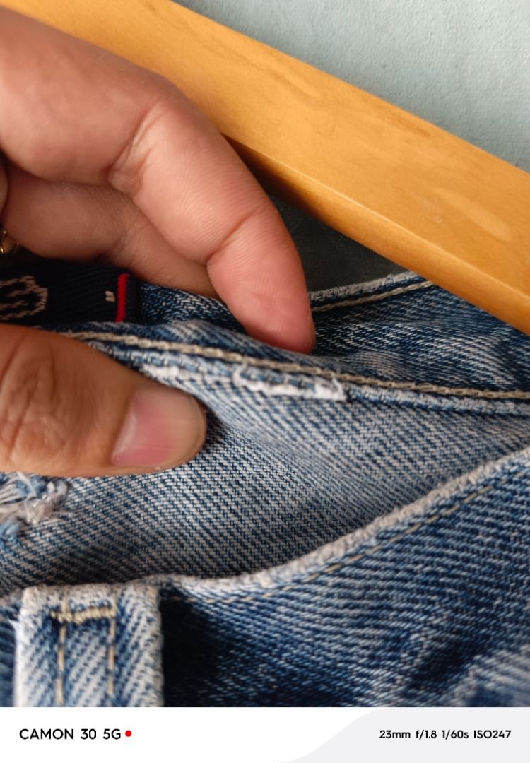 Vintage Jnco Denim (Category: Jeans) located in San Jose. Submitted by jerickimbi66675 (Listing ID 1468777548, Image 3). Description: - 32-33 x 22 x 10 ‎- Color rate :8.5 ‎- Issue : altered width, cut info tag, scratches, remove side pocket - 90s streetwear staple from JNCO Jeans - Classic blue denim with a durable, heavy wash finish - Metal button closure with stylish red accent stitching on the buttonhole.