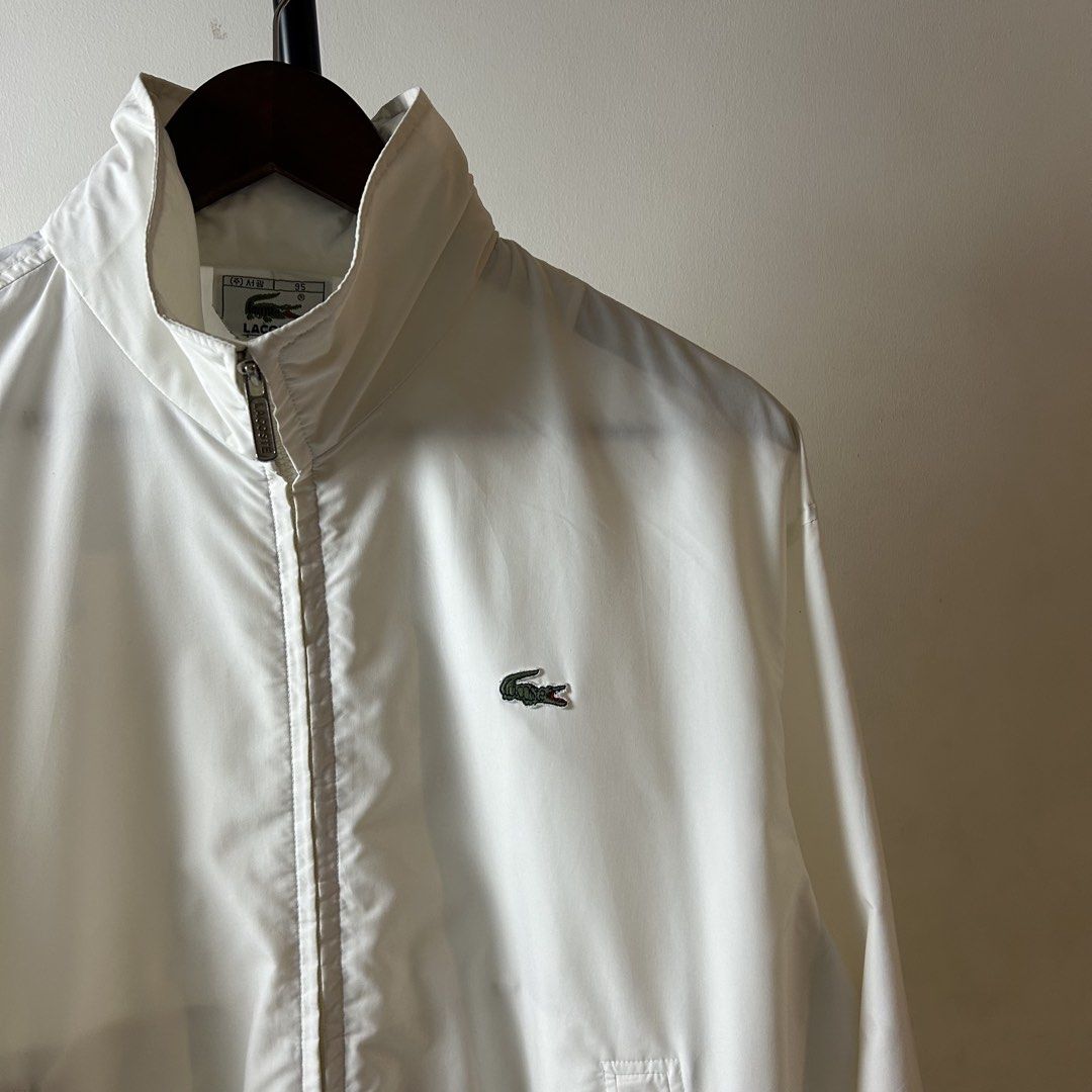 Vintage Lacoste Packable Hood Windbreaker (Category: Coats, Jackets and Outerwear) located in Bacolod City. Submitted by dashloots (Listing ID 1468884030, Image 2). Description: Vintage Lacoste Packable Hood Windbreaker Jacket White colorway 95 / Medium on tag W-24.5’ , L-26’ Flaws: sign of used Mode of delivery: (J&T) 📦 Price: 1,500 Negotiable for sure buyers! Location: Bacolod City, Negros Occ.📍.