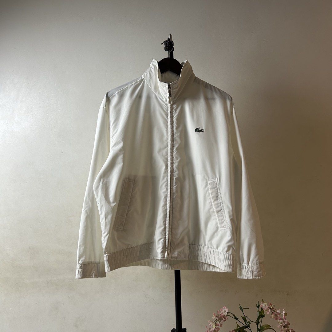 Vintage Lacoste Packable Hood Windbreaker (Category: Coats, Jackets and Outerwear) located in Bacolod City. Submitted by dashloots (Listing ID 1468884030, Image 1). Description: Vintage Lacoste Packable Hood Windbreaker Jacket White colorway 95 / Medium on tag W-24.5’ , L-26’ Flaws: sign of used Mode of delivery: (J&T) 📦 Price: 1,500 Negotiable for sure buyers! Location: Bacolod City, Negros Occ.📍.