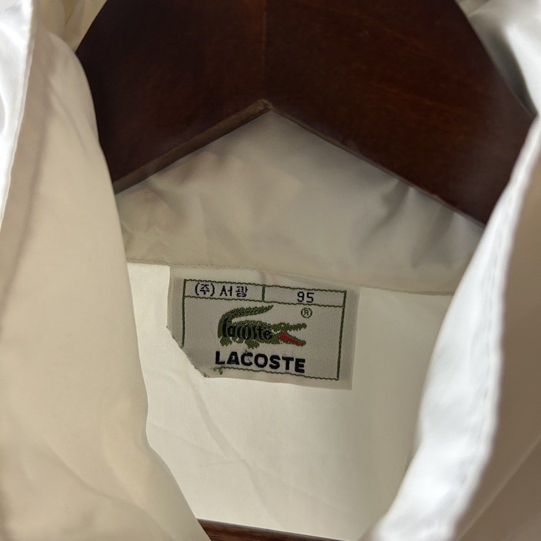 Vintage Lacoste Packable Hood Windbreaker (Category: Coats, Jackets and Outerwear) located in Bacolod City. Submitted by dashloots (Listing ID 1468884030, Image 3). Description: Vintage Lacoste Packable Hood Windbreaker Jacket White colorway 95 / Medium on tag W-24.5’ , L-26’ Flaws: sign of used Mode of delivery: (J&T) 📦 Price: 1,500 Negotiable for sure buyers! Location: Bacolod City, Negros Occ.📍.