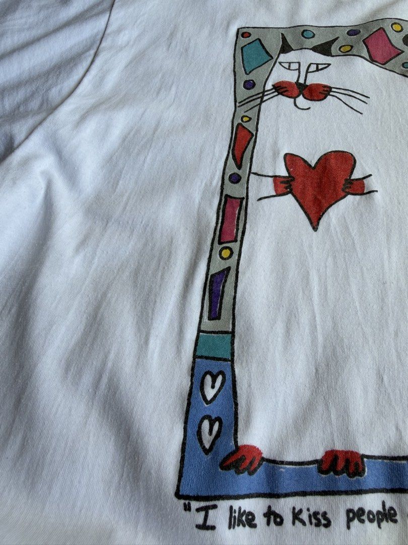 Vintage Martha Wahlert Art Tee (Category: Tshirts & Polo Shirts ) located in Makati City. Submitted by thethrilltofind (Listing ID 1468858239, Image 3). Description: Vintage Martha Wahlert Art Tee “I like to kiss people on the lips... at night!” 😽 1-1-2 Stitching Large on tag 20.5x28.5 ₱2000 only.