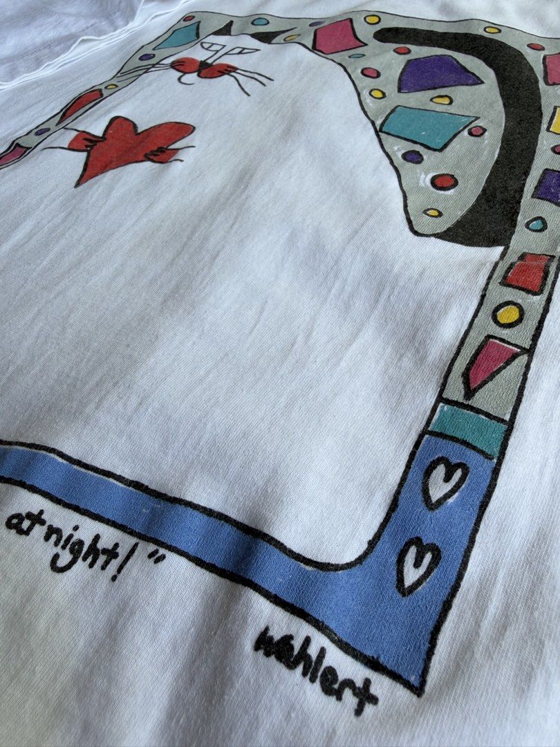 Vintage Martha Wahlert Art Tee (Category: Tshirts & Polo Shirts ) located in Makati City. Submitted by thethrilltofind (Listing ID 1468858239, Image 2). Description: Vintage Martha Wahlert Art Tee “I like to kiss people on the lips... at night!” 😽 1-1-2 Stitching Large on tag 20.5x28.5 ₱2000 only.