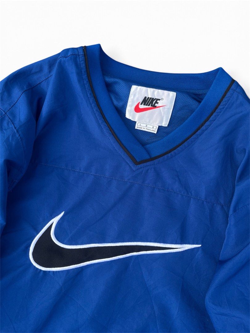Vintage nike pullover windbreaker (Category: Coats, Jackets and Outerwear) located in Manila. Submitted by thrift_tg (Listing ID 1468919308, Image 3). Description: Vintage 90’s Nike Pullover Windbreaker Royal Blue / Black Center Swoosh Dimes: 24 x 28 Size: L on tag - fits L to XL (baggy fit) Color rate: 9.5/10 Condition: 9.5/10 - No Issue, Like New • Big center swoosh embroidery (black with white outline) • V-neck pullover windbreaker • Drawstrin