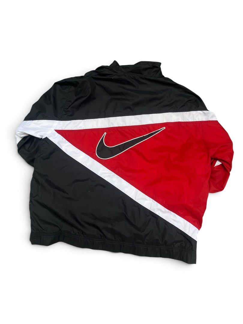 Vintage nike windbreaker (Category: Coats, Jackets and Outerwear) located in Manila. Submitted by thrift_tg (Listing ID 1468918227, Image 3). Description: Vintage 90’s Nike Windbreaker Red / Black / White - Bulls Colorway Dimes: 26/28 Size: XL on tag Color rate: 9/10 Condition: 7.5/10 to 8/10 Issues: • Loose ribbing (maluwag na cuffs/hem - common sa vintage) • Loose stitching on big swoosh back embroidery - may konting slice/tanggal tahi sa white