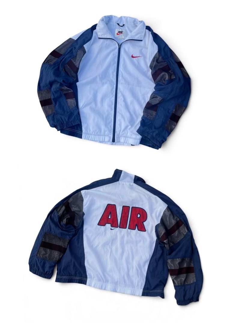 Vintage nike windbreaker (Category: Coats, Jackets and Outerwear) located in Manila. Submitted by thrift_tg (Listing ID 1468918855, Image 1). Description: Vintage 90’s Nike AIR Windbreaker Jacket White / Navy / Red Colorway Dimes: 25.5 x 26 Size: M on tag - fits M to L Color rate: 9/10 Condition: 8.5/10 Issue: Maluwag na ribbings sa cuffs/hem + may scratches sa ribbings (common sa vintage) - still wearable, not super noticeable when worn • Small 