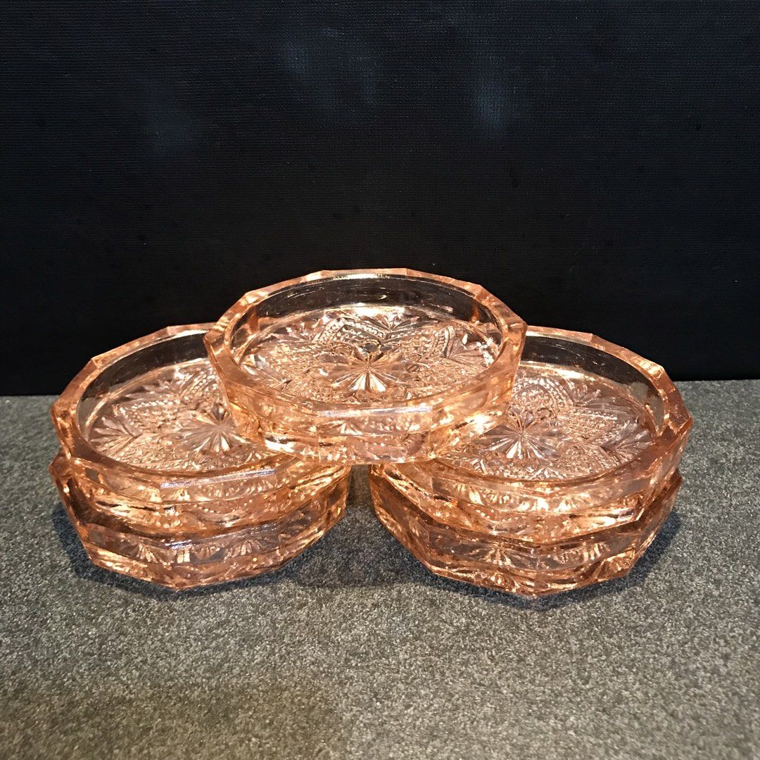 Vintage Pink Depression Glass Pressed Pattern Coasters Set (Category: Dinnerware & Cutlery) located in Baao. Submitted by all.things.japan (Listing ID 1468749154, Image 3). Description: - Set of 5 beautiful pink pressed glass coasters - Chic octagonal shape with intricate starburst pattern - Heavy and solid vintage glassware - Perfect for coffee tables, dining sets, or home styling - Message for inquiries or fast shipping!.