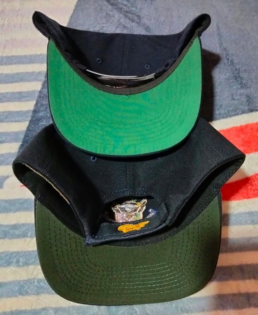 Vintage USS Navy Command Caps Snapback Hat Bundle (2 pcs) (Category: Caps & Hats) located in Mangaldan. Submitted by niftythrifty69 (Listing ID 1468734538, Image 2). Description: - 2 vintage navy caps in black with green under brims - Cap 1: USS Essex LHD 2 with Northstar tag - Cap 2: USS Boxer LHD 4 by Navy Command Caps - Detailed embroidered patches on the crown - Fully working snapback closures - Great collectible pieces for military memorabil