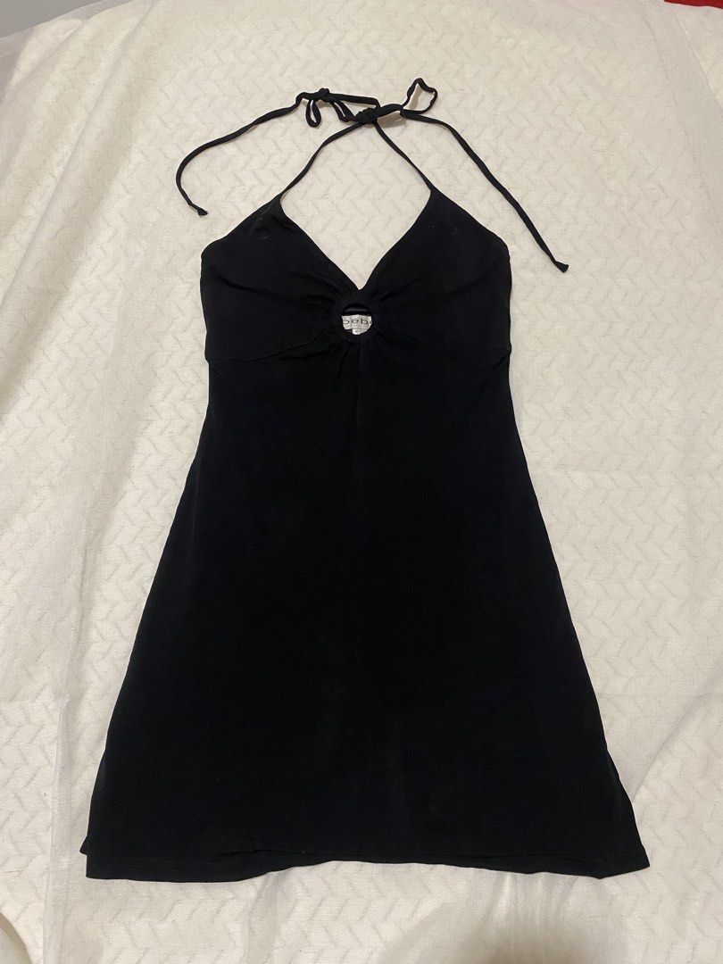 Vintage Y2k BEBE Halter Black Mini Dress (Category: Dresses) located in Marilao. Submitted by kyssmarila (Listing ID 1468874849, Image 2). Description: — Size: S on tag Waistline: 26-28” Bust: 32-34” Length: 28” — Condition: 9/10 — Flaws: None.