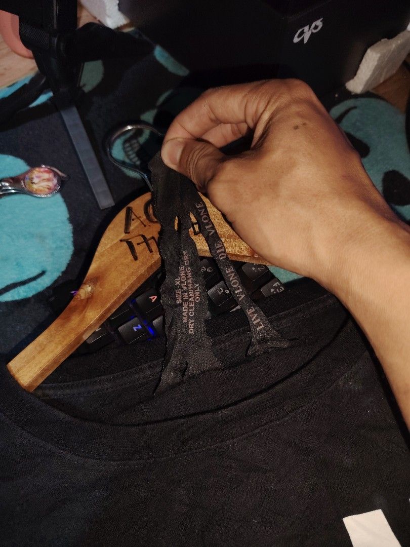 Vlone Black Tie Dye V Logo Tee Size XL (Category: Tshirts & Polo Shirts ) located in Roxas, Palawan. Submitted by act_thrift_palawan (Listing ID 1468734521, Image 2). Description: - Brand: Vlone - Color: Black with colorful tie-dye back graphic - Size: XL (Measures approx. 23" chest x 31" length) - Condition: Great streetwear piece, comfortable fit for daily wear - Details: Classic front logo, interior tag with branding and care instructions inta