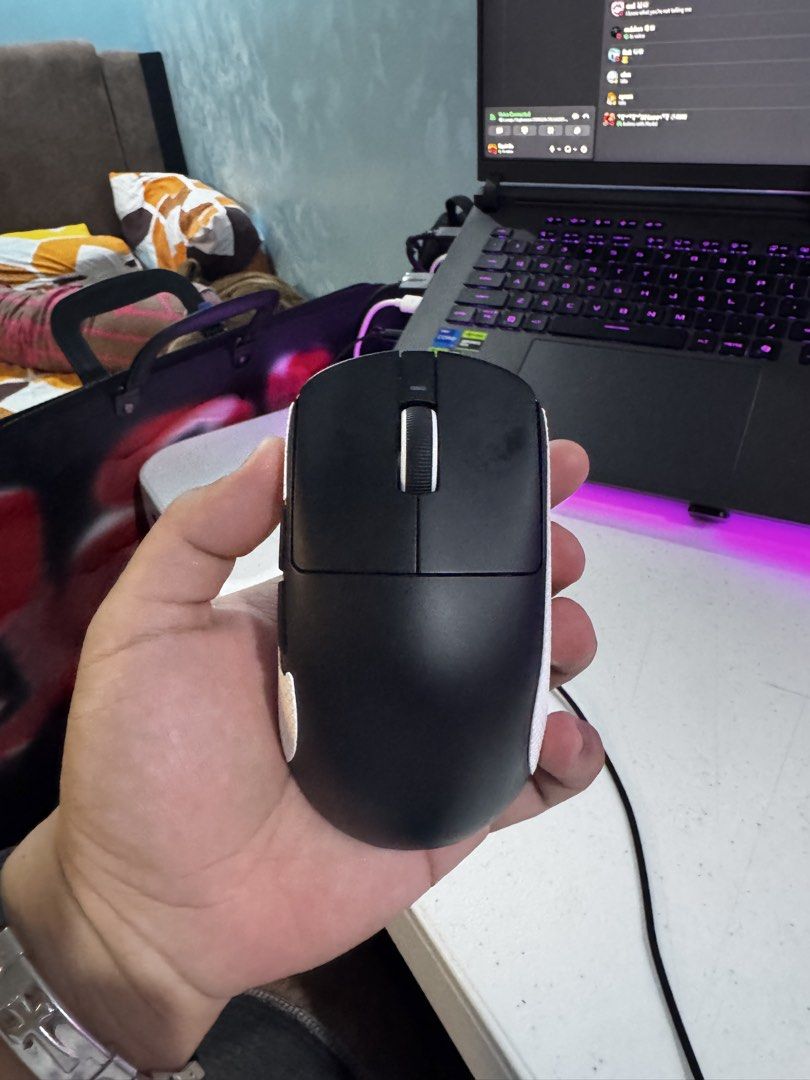 VXE R1 Pro Max (Category: Mouse & Mousepads) located in Caloocan City. Submitted by havinny11 (Listing ID 1468904855, Image 1). Description: - Color: Black wireless gaming mouse with white textured side grip tape - Design: Lightweight build with 2 convenient left-side buttons - Connectivity & Charging: Wireless with a front Type-C charging port - Sensor: High-precision optical sensor with bottom power switch - Condition: Excellent working conditi