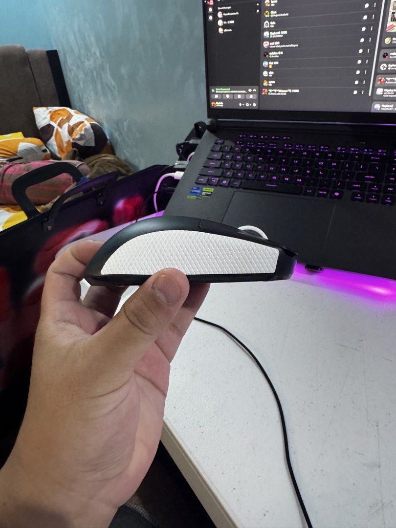 VXE R1 Pro Max (Category: Mouse & Mousepads) located in Caloocan City. Submitted by havinny11 (Listing ID 1468904855, Image 2). Description: - Color: Black wireless gaming mouse with white textured side grip tape - Design: Lightweight build with 2 convenient left-side buttons - Connectivity & Charging: Wireless with a front Type-C charging port - Sensor: High-precision optical sensor with bottom power switch - Condition: Excellent working conditi