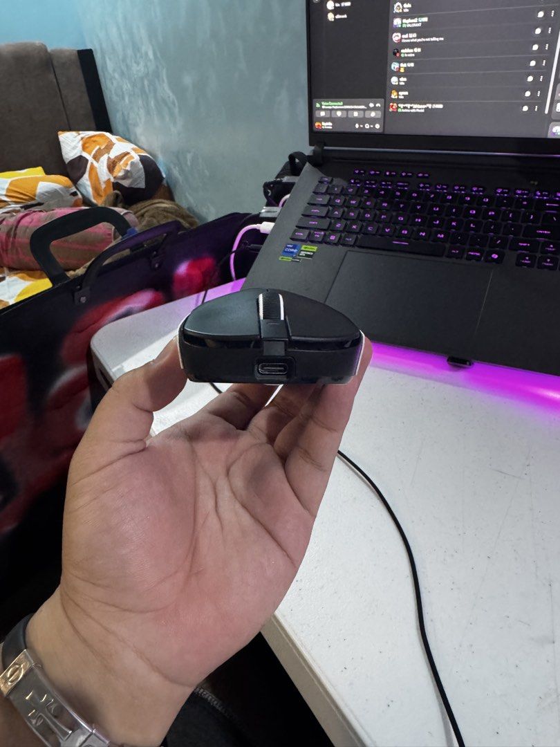 VXE R1 Pro Max (Category: Mouse & Mousepads) located in Caloocan City. Submitted by havinny11 (Listing ID 1468904855, Image 3). Description: - Color: Black wireless gaming mouse with white textured side grip tape - Design: Lightweight build with 2 convenient left-side buttons - Connectivity & Charging: Wireless with a front Type-C charging port - Sensor: High-precision optical sensor with bottom power switch - Condition: Excellent working conditi
