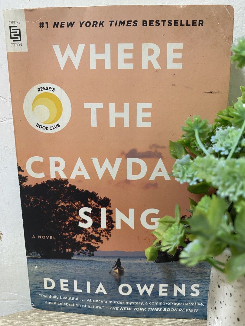 Where The Crawdads Sing by Delia Owens (Category: Storybooks) located in Quezon City. Submitted by cidrisse (Listing ID 1468838640, Image 1). Description: - Title: Where The Crawdads Sing by Delia Owens - Edition: Export paperback with Reese's Book Club cover stamp - Status: #1 New York Times bestseller - Condition: Read once, clean and intact pages, minor spine creases from reading - Genre: Captivating mystery and nature narrative.