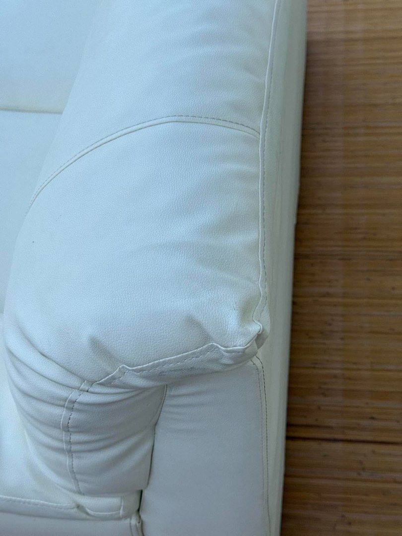 White 2-Seater Leather Sofa with Chrome Legs (Category: Sofas) located in Manila. Submitted by justinlei.103 (Listing ID 1468849675, Image 3). Description: JAPAN SURPLUS 2 SEATER WHITE LEATHER SOFA IN GOOD CONDITION SIZE: 16H x 59L x 33.5W inches.